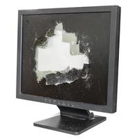 broken monitor with damaged glass screen isolated photo