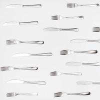 above view of many table knives and forks photo