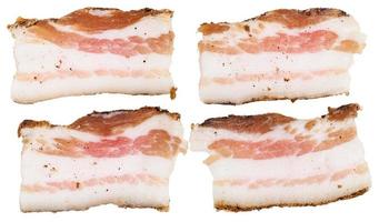 four pieces of speck isolated on white photo