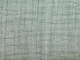 textile background - green transparent silk fabric photo