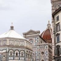 domes of Florence Baptistery and Duomo Cathedral photo