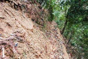 path through landslide on mountain slope photo