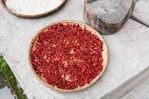 pieces of red hot pepper on plate dry outdoors photo