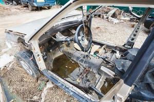 disassembled car at an automobile country yard photo