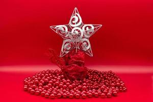 Christmas decoration. Christmas ornaments. Red background. photo