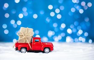Home delivery concept. Delivery of gifts in winter for Christmas and New Year. Sales, shopping. photo