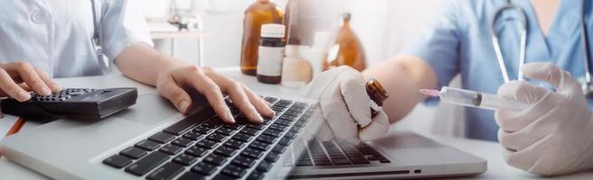 Medicine doctor hand working on a patients x-ray scans digital healthcare and connection with modern virtual screen interface icons, Medical technology and network concept. photo
