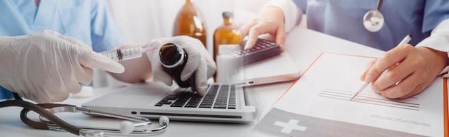 Medicine doctor hand working on a patients x-ray scans digital healthcare and connection with modern virtual screen interface icons, Medical technology and network concept. photo