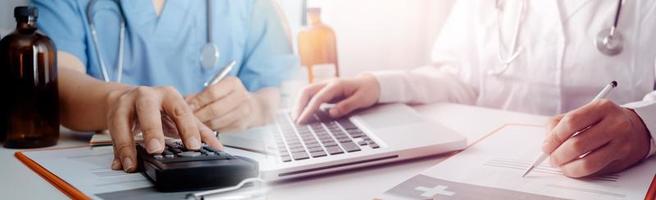 Medicine doctor hand working on a patients x-ray scans digital healthcare and connection with modern virtual screen interface icons, Medical technology and network concept. photo