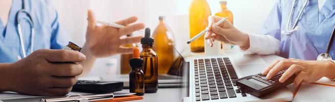 Medicine doctor hand working on a patients x-ray scans digital healthcare and connection with modern virtual screen interface icons, Medical technology and network concept. photo