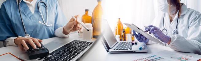 Medicine doctor hand working on a patients x-ray scans digital healthcare and connection with modern virtual screen interface icons, Medical technology and network concept. photo