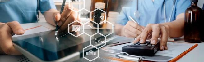 Medicine doctor hand working on a patients x-ray scans digital healthcare and connection with modern virtual screen interface icons, Medical technology and network concept. photo