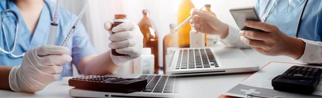 Medicine doctor hand working on a patients x-ray scans digital healthcare and connection with modern virtual screen interface icons, Medical technology and network concept. photo