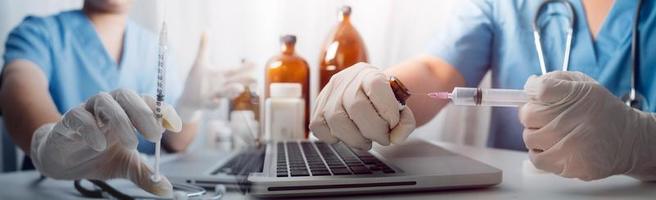 Medicine doctor hand working on a patients x-ray scans digital healthcare and connection with modern virtual screen interface icons, Medical technology and network concept. photo