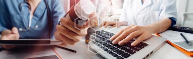 Medicine doctor hand working on a patients x-ray scans digital healthcare and connection with modern virtual screen interface icons, Medical technology and network concept. photo