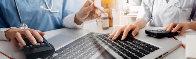 Medicine doctor hand working on a patients x-ray scans digital healthcare and connection with modern virtual screen interface icons, Medical technology and network concept. photo