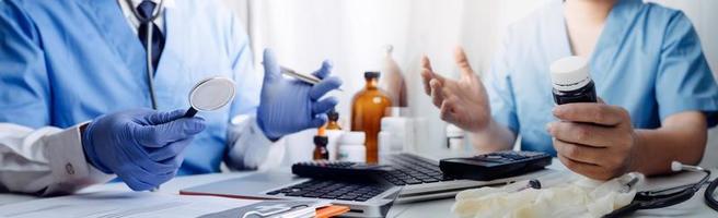 Medicine doctor hand working on a patients x-ray scans digital healthcare and connection with modern virtual screen interface icons, Medical technology and network concept. photo