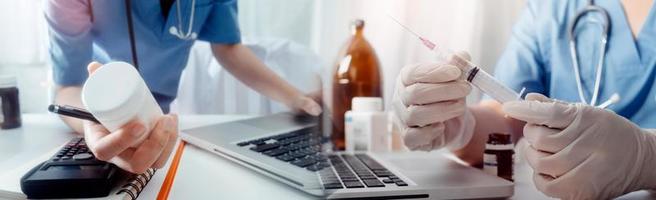 Medicine doctor hand working on a patients x-ray scans digital healthcare and connection with modern virtual screen interface icons, Medical technology and network concept. photo