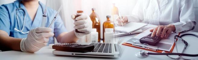 Medicine doctor hand working on a patients x-ray scans digital healthcare and connection with modern virtual screen interface icons, Medical technology and network concept. photo