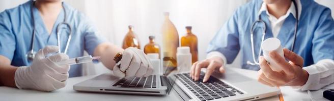 Medicine doctor hand working on a patients x-ray scans digital healthcare and connection with modern virtual screen interface icons, Medical technology and network concept. photo