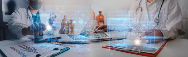 Medicine doctor hand working on a patients x-ray scans digital healthcare and connection with modern virtual screen interface icons, Medical technology and network concept. photo