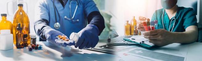 Medicine doctor hand working on a patients x-ray scans digital healthcare and connection with modern virtual screen interface icons, Medical technology and network concept. photo