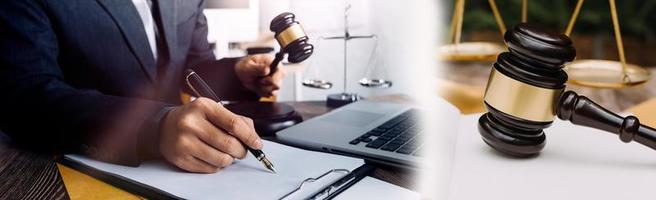 Business and lawyers discussing contract papers with brass scale on desk in office. Law, legal services, advice, justice and law concept picture with film grain effect photo