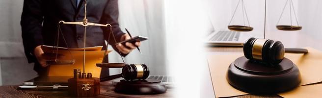 Business and lawyers discussing contract papers with brass scale on desk in office. Law, legal services, advice, justice and law concept picture with film grain effect photo