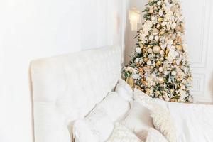 Classic christmas New Year decorated interior room New year tree with golden ornament decorations photo