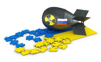 A nuclear bomb with the image of the Russian flag and puzzles in the form of the Ukrainian flag. 3d render. photo