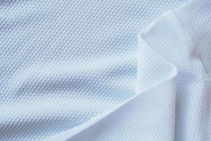 White football jersey clothing fabric texture sports wear background photo