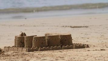 Sand castle fortress on the tropical beach video