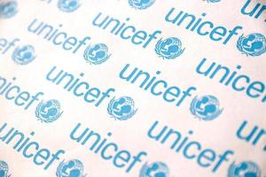 TERNOPIL, UKRAINE - MAY 2, 2022 Unicef logo on paper. Unicef is a United Nations programm that provides humanitarian and developmental assistance to children and mothers