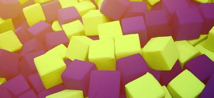 Many colorful soft blocks in a kids' ballpit at a playground photo