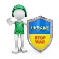 soldier next to a shield of Ukraine photo