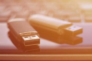 Memory cards on the laptop keyboard photo