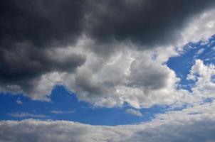 Image of a cloudy blue sky in a gloomy and ragged day photo