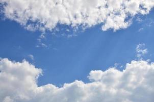 Beautiful blue sky background template with some space for input text message below isolated on blue photo