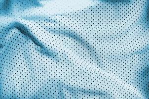 Close up of light blue polyester nylon sportswear shorts to created a textured background photo