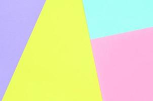 Texture background of fashion pastel colors. Pink, violet, yellow and blue geometric pattern papers. minimal abstract photo