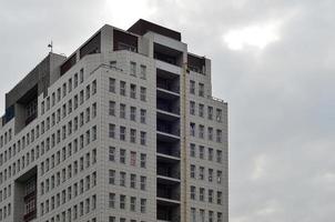 Multi-story office building with blue sky photo