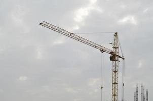 Tower crane against a blue sky photo