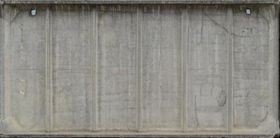 Close-up weathered and stained obsolete concrete wall texture photo