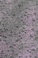 Monochromatic texture of granite surface photo