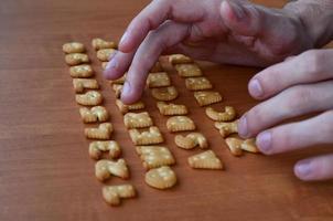 Hands on cracker keyboard buttons photo