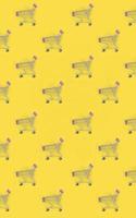 Shopping addiction, shopping lover or shopaholic concept. Many small empty shopping carts perform a pattern on a pastel colored paper background. Flat lay composition, top view photo