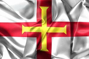 Guernsey flag - realistic waving fabric flag photo