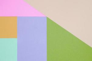 Texture background of fashion pastel colors. Pink, violet, orange, green, beige and blue geometric pattern papers photo