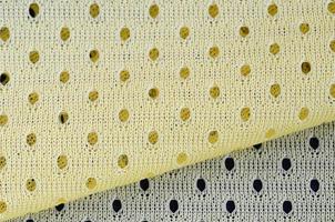 Yellow mesh sport wear fabric textile background pattern photo