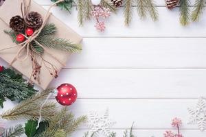 Merry Christmas and Happy New Year decoration for celebration on white wood background with copy space photo